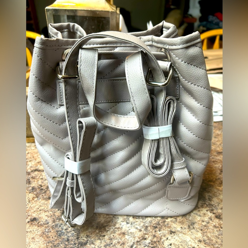 Leather backpack grey new never used